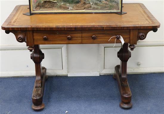 An early Victorian rosewood library table with leather top W.117cm